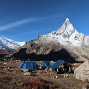 Nandanvan Campsite with Shivling towering on the right, Kedardome is seen on the left