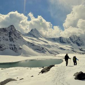 The beautiful emerald green lake on the Kalihani glacier.